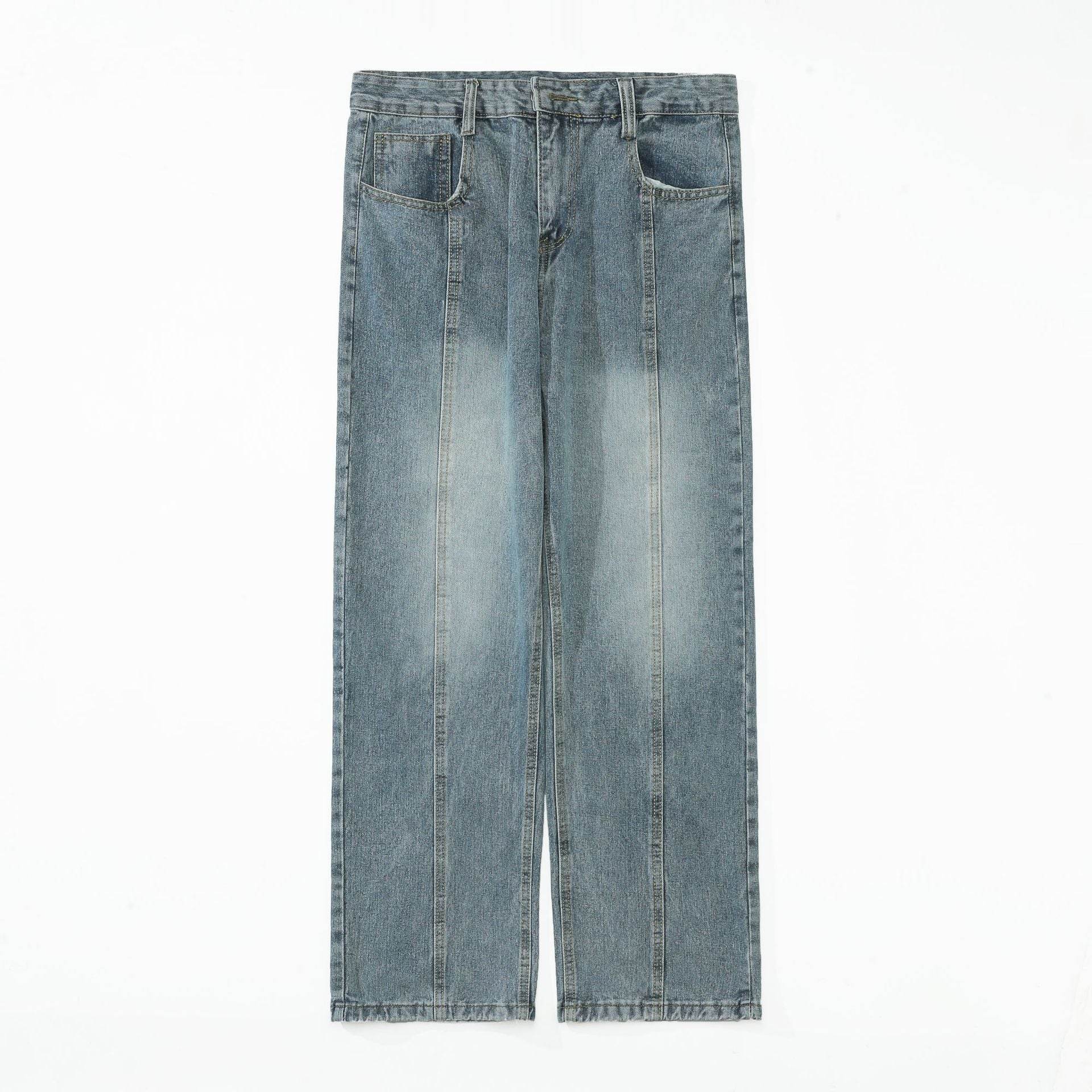 Pantaloni drepți vintage prespălați. Blugi drepți albastru deschis din denim cu talie medie și cusături verticale