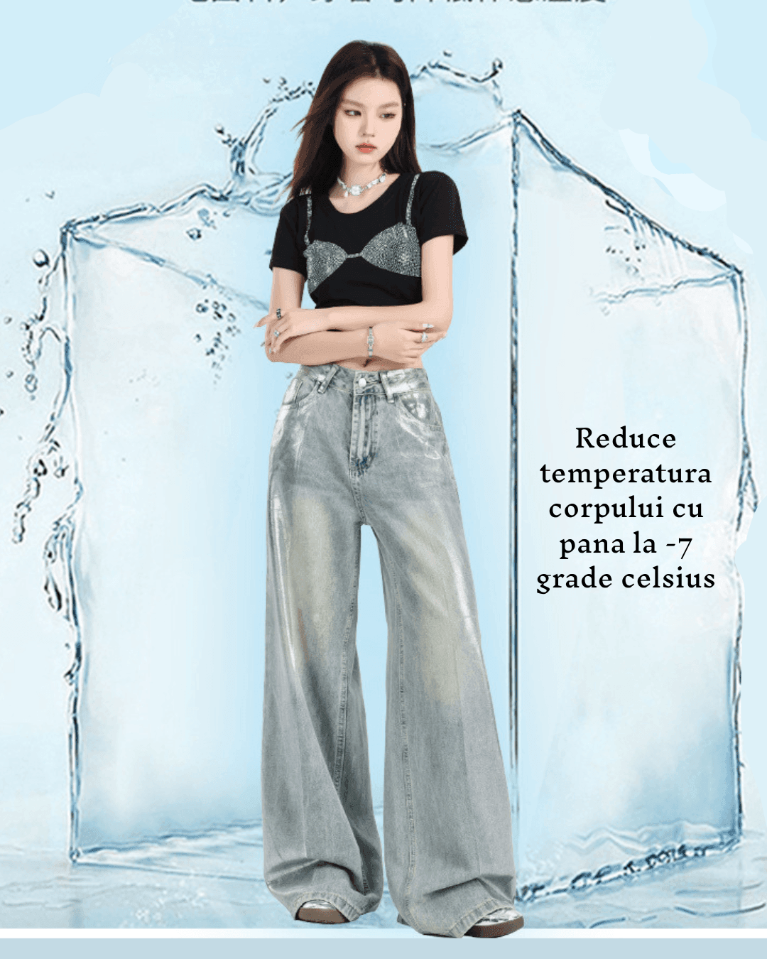 Femeie purtând pantaloni argintii strălucitori largi și tricou negru într-un decor cu efect de gheață
