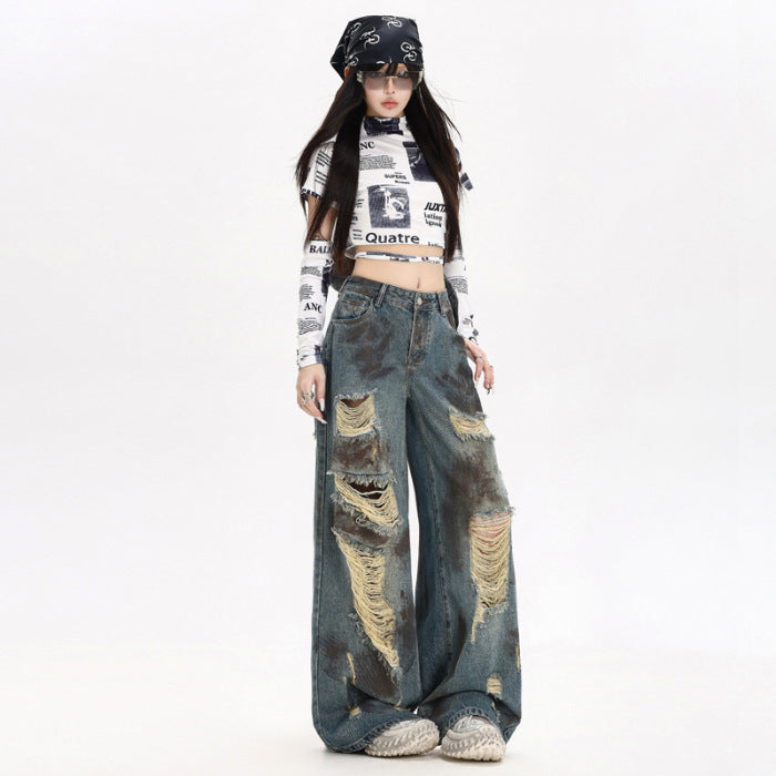 Model tanara poarta Blugi evazați distruși albastri cu rupturi mari talie joasa look urban AM Vision RO