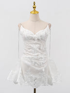 Ivory Siren Lace Mini Dress with delicate lace detailing and a flared hem for a stylish look