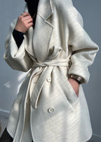 Adele Double Wool Coat in cream with a belt and oversized fit, perfect for stylish winter layering