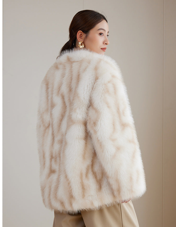 Elegant woman in an Apricot Eco Mink Coat with a plush, textured design ideal for winter fashion