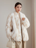 Elegant model wearing an Apricot Eco Mink Coat with a luxurious fur texture, styled with a handbag