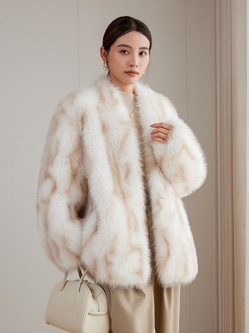 Elegant model wearing an Apricot Eco Mink Coat with a luxurious fur texture, styled with a handbag