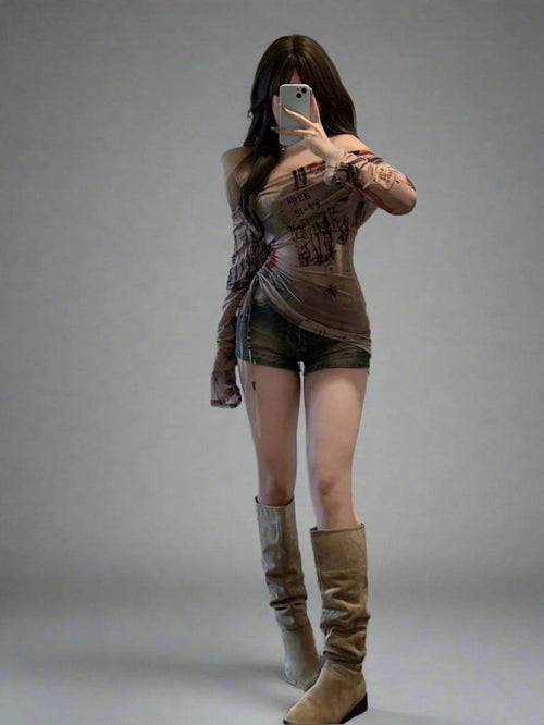 Stylish asymmetric top in beige with one shoulder design, paired with denim shorts and knee-high boots.