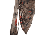 Artistic print on a lightweight asymmetric top featuring a stylish draped design