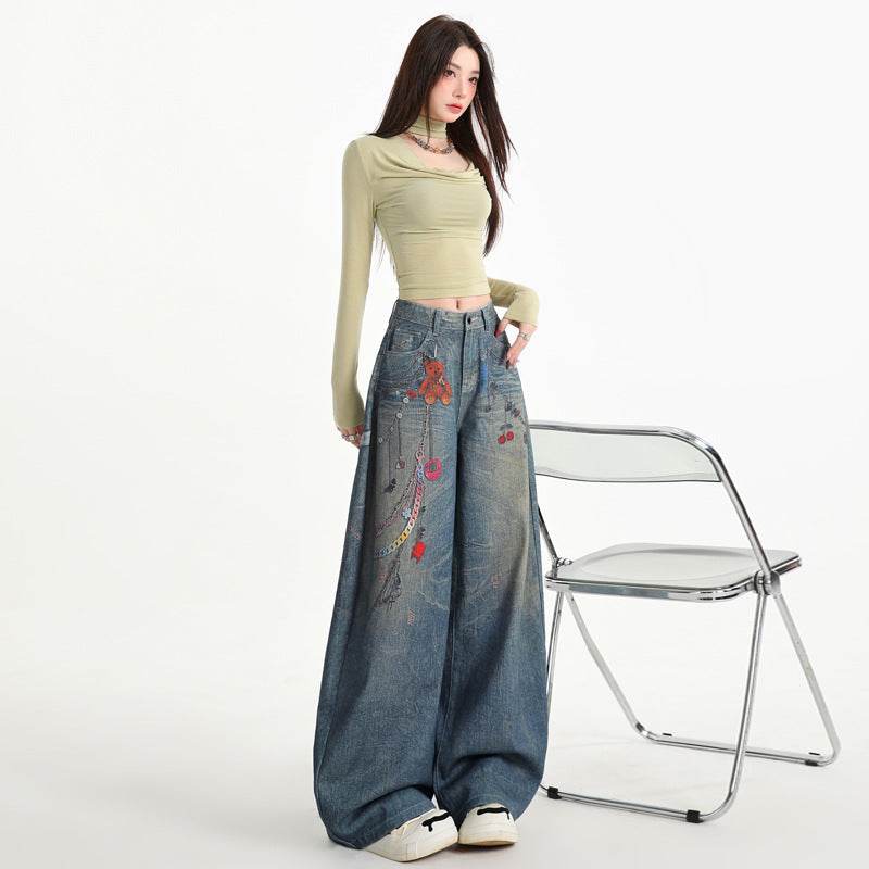 Model poartă Pantaloni largi cu imprimeu digital 3D denim cu motive florale colorate talie înaltă top crop verde