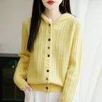 Auriell Wool Hooded Cardigan in yellow with textured design and colorful buttons for a cozy look