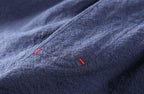 Close-up of Autumn Linen Pants showing textured fabric and stitching details