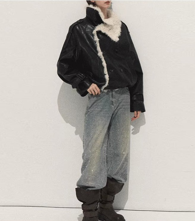 Stylish model wearing Autumn Sparkling 3D Rhinestone Straight-Leg Jeans with a black leather jacket