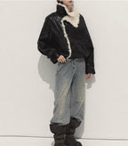 Stylish model wearing Autumn Sparkling 3D Rhinestone Straight-Leg Jeans with a black leather jacket