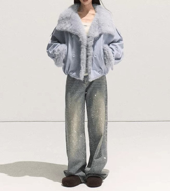 Stylish model wearing Autumn Sparkling 3D Rhinestone Straight-Leg Jeans with a cozy blue jacket