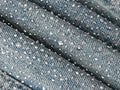 Close-up of Autumn Sparkling 3D Rhinestone Straight-Leg Jeans with shimmering rhinestones on denim fabric