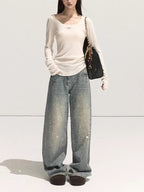 Autumn Sparkling 3D Rhinestone Straight-Leg Jeans worn with a light top and stylish handbag for a trendy look