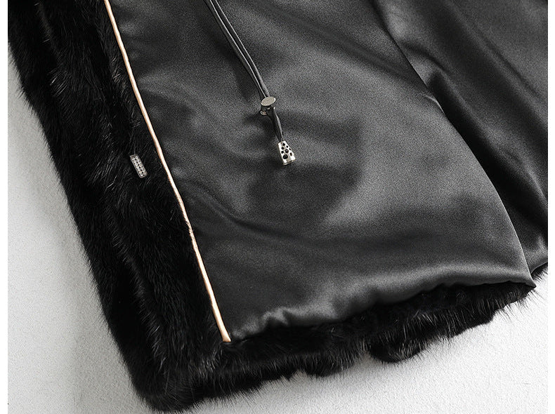 Aveline Noir Mink Coat in sleek black with luxurious fur inner lining and elegant zip details