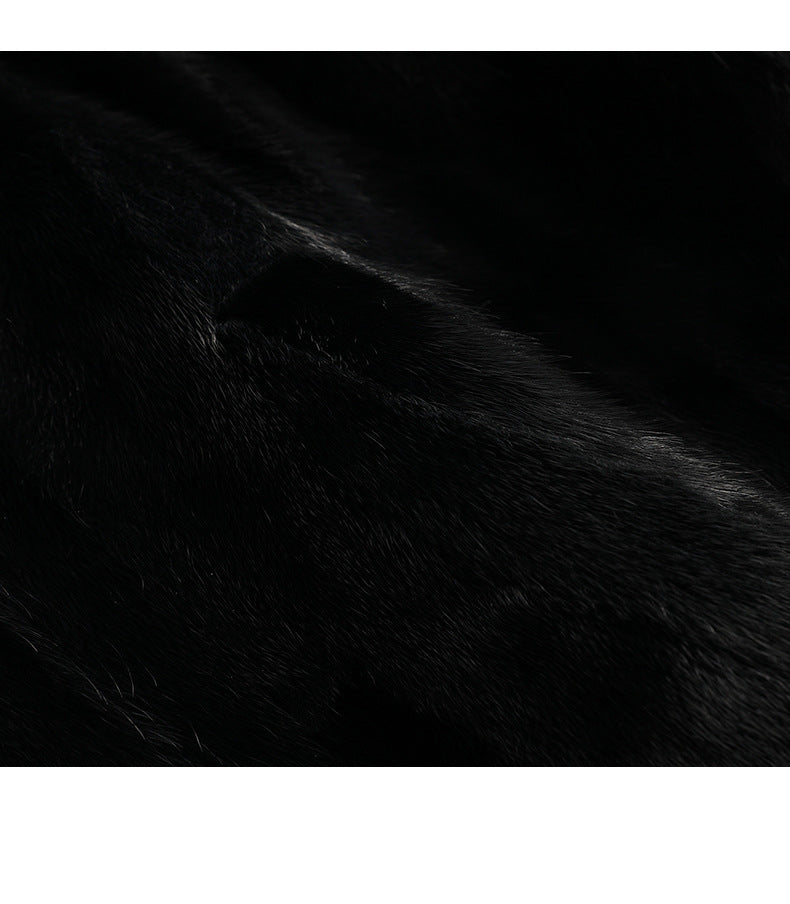 Close-up of the luxurious texture of the Aveline Noir Mink Coat in deep black color