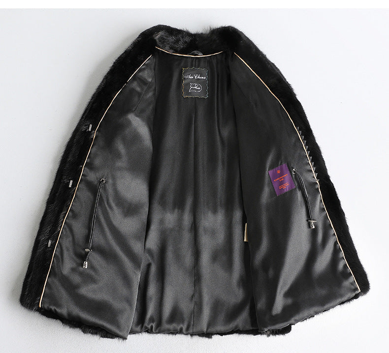 Inside view of Aveline Noir Mink Coat featuring luxurious lining and detailing for a stylish look