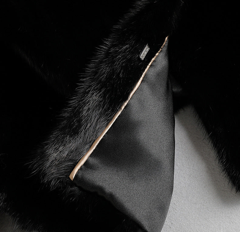 Interior view of Aveline Noir Mink Coat showcasing luxurious linings and premium materials