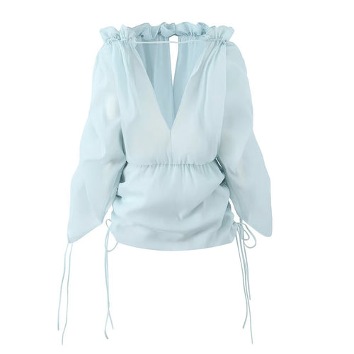 Close-up of the open back detail of the AM Vision Backless Mini Dress