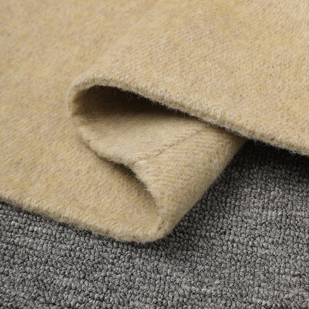 Close-up of Beige Wool Coat With Wrap Belt, Soft Texture showcasing its luxurious fabric detail