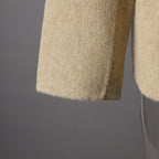 Beige Wool Coat With Wrap Belt, Soft Texture showcasing a close-up of the sleeve detail