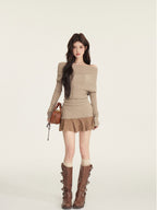 Black Knitted Sweater Dress With Spliced Skirt featuring a unique design and stylish aesthetic