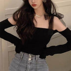 Black strap blouse for women with slim-fit design and sheer shoulder straps