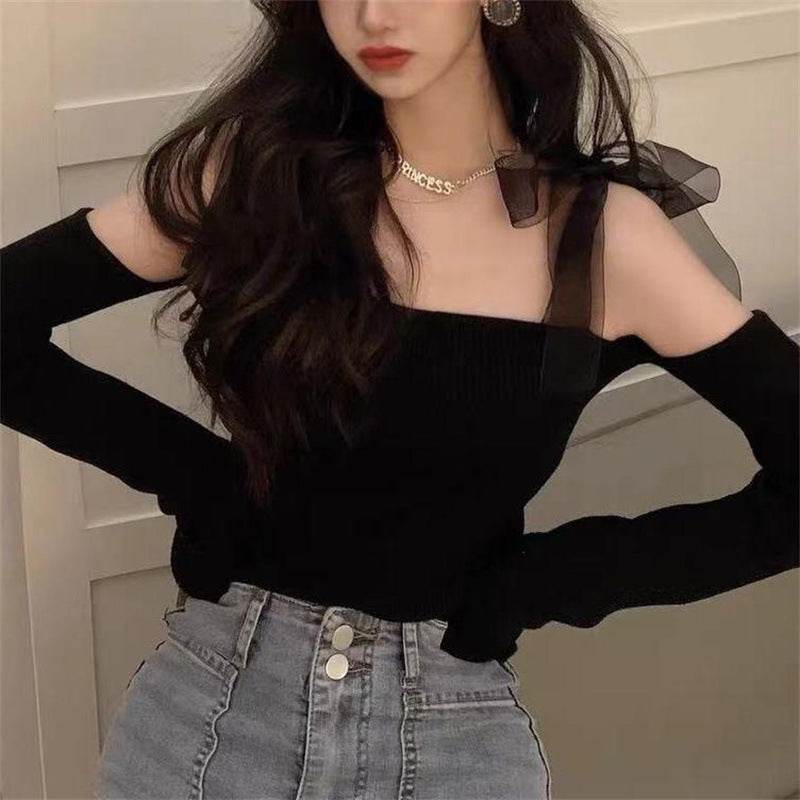 Black strap blouse for women with slim-fit design and sheer shoulder straps