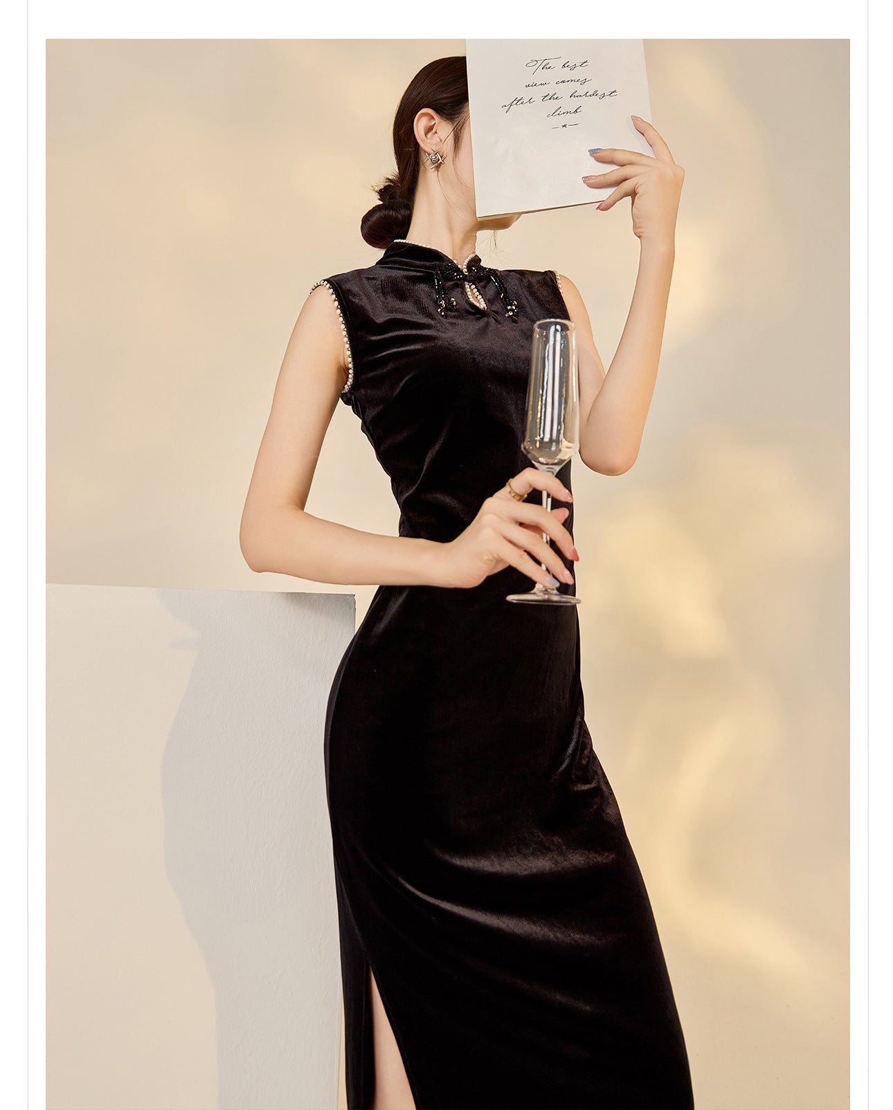 Elegant black velvet dress with beads featuring a side slit, perfect for special occasions