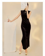Elegant black velvet dress with beads featuring a sleek design and high slit for sophisticated style