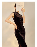 Elegant black velvet dress with beads featuring a chic high neckline and a sleek silhouette