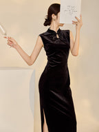 Elegant black velvet dress with beads featuring a high neckline and thigh-high slit