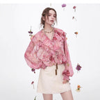 Blossom Whisper Ruffled Chiffon Blouse in pink with floral prints and ruffled detailing