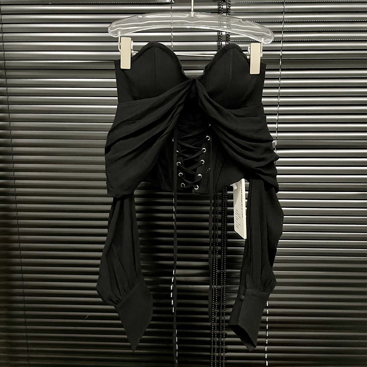 Elegant black Blouse with Corset and Bare Shoulders featuring ruched fabric and adjustable laces