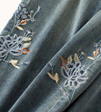 Close-up of Blue Lotus Retro Embroidered Jeans featuring intricate floral embroidery details on denim fabric