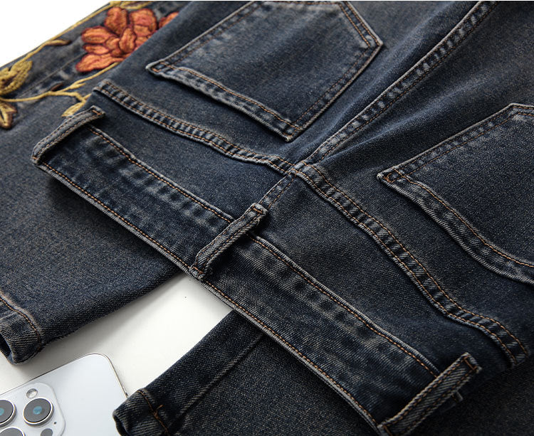 Blue Sakura Embroidered Wide Leg Jeans with detailed floral embroidery on the back pockets