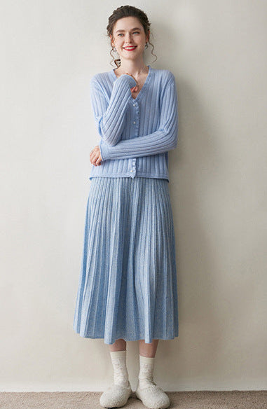 Light blue cashmere lace cardigan paired with a matching pleated skirt for a stylish look