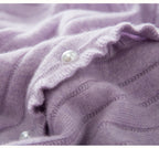 Soft lavender cashmere lace cardigan with delicate stripes and pearl detailing