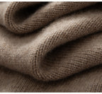 Soft brown cashmere turtleneck sweater for women showcasing luxurious fabric texture