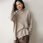 Light beige cashmere turtleneck sweater for women with relaxed fit and modern style