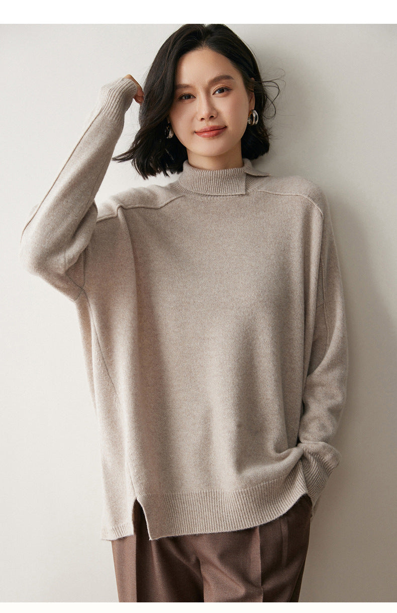 Soft beige cashmere turtleneck sweater for women with a relaxed fit and long sleeves
