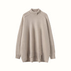 Beige cashmere turtleneck sweater for women with a relaxed fit and ribbed details