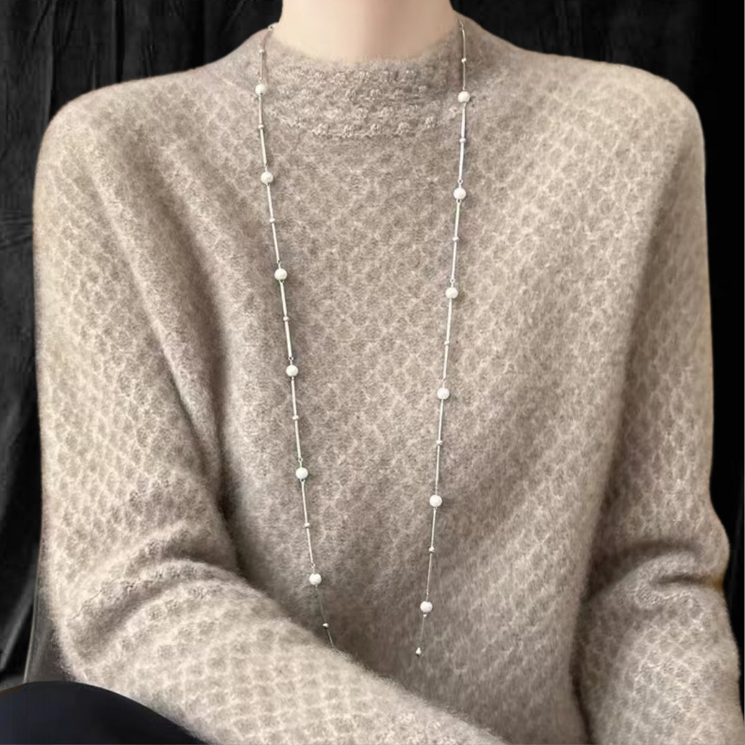 Casual Cashmere Sweater With Elegant Crochet And Semi-High Collar in soft beige with stylish pearl necklace