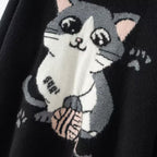 Cozy cat cashmere sweater featuring an adorable cat design playing with yarn