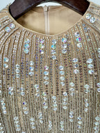 Close-up of Celestia Embellished Mini Dress featuring shimmering sequins and intricate detailing
