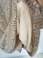 Close-up of the Celestia Embellished Mini Dress showing shimmering sequin details and soft inner lining