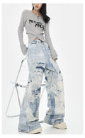 Model wearing Cloud Wash High Street Wide Leg Jeans paired with a stylish ribbed top for a modern look