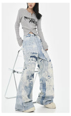 Model wearing Cloud Wash High Street Wide Leg Jeans paired with a stylish ribbed top for a modern look