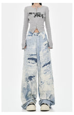 Cloud Wash High Street Wide Leg Jeans with a relaxed fit, styled with a cropped top and sneakers