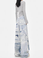 Back view of Cloud Wash High Street Wide Leg Jeans with a stylish oversized fit and unique wash pattern